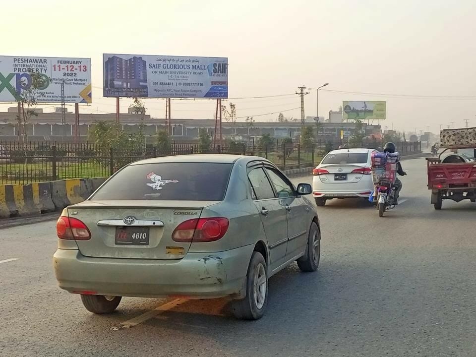 Close-up of ad on Billboard at Peshawar Toll Plaza