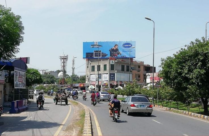 Large format outdoor advertising display at Wapda Town Roundabout Lahore