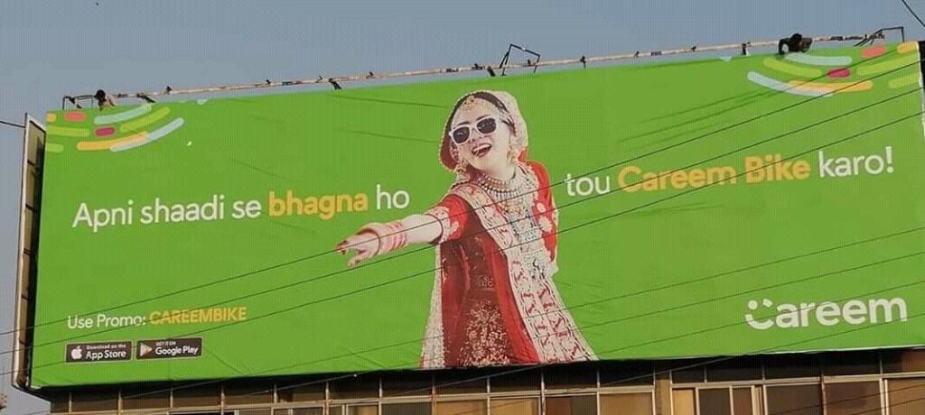 Large roadside billboard in Gulberg Lahore showcasing advertising in pakistan campaign